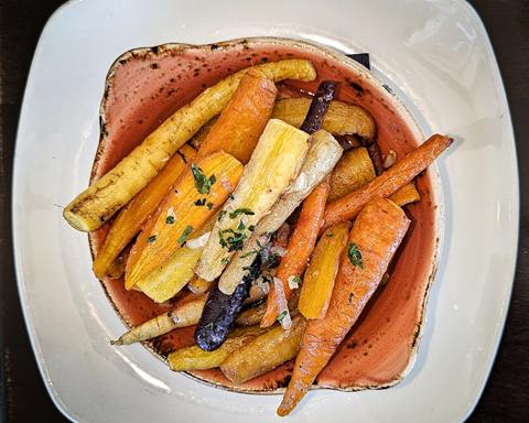 Serving inspiration: Roasted baby carrots in a white bowl. Not verified as this exact recipe.