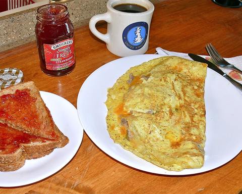 Serving inspiration: An omelette with onions and mushrooms, served with whole-wheat toast and jam. Not verified as this exact recipe.