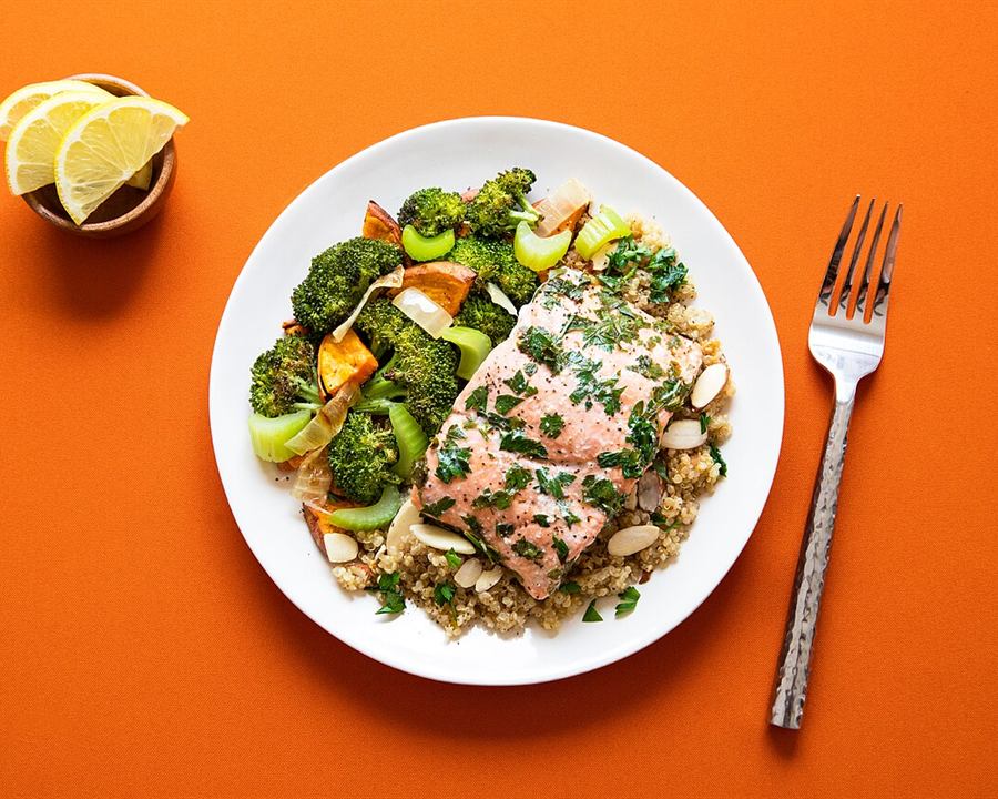 Salmon with broccoli, sweet potato and celery on a bed of quinoa